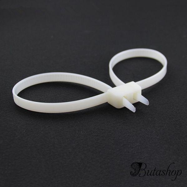 Одноразовые многоцелевые наручники белые - www.butashop.com